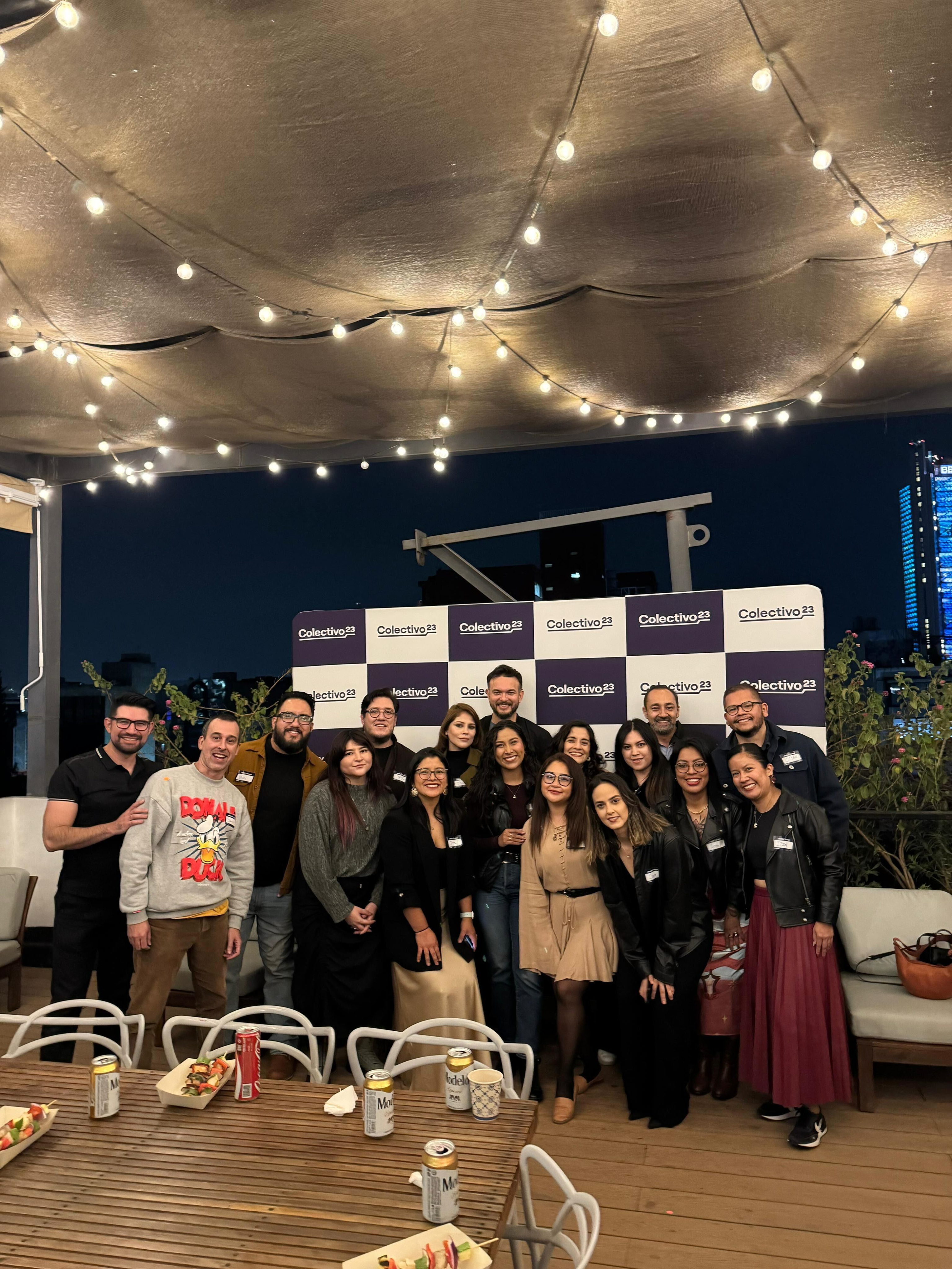 Graphic of a typography specimen showing the alphabet and numerals on top of a dark gray background.